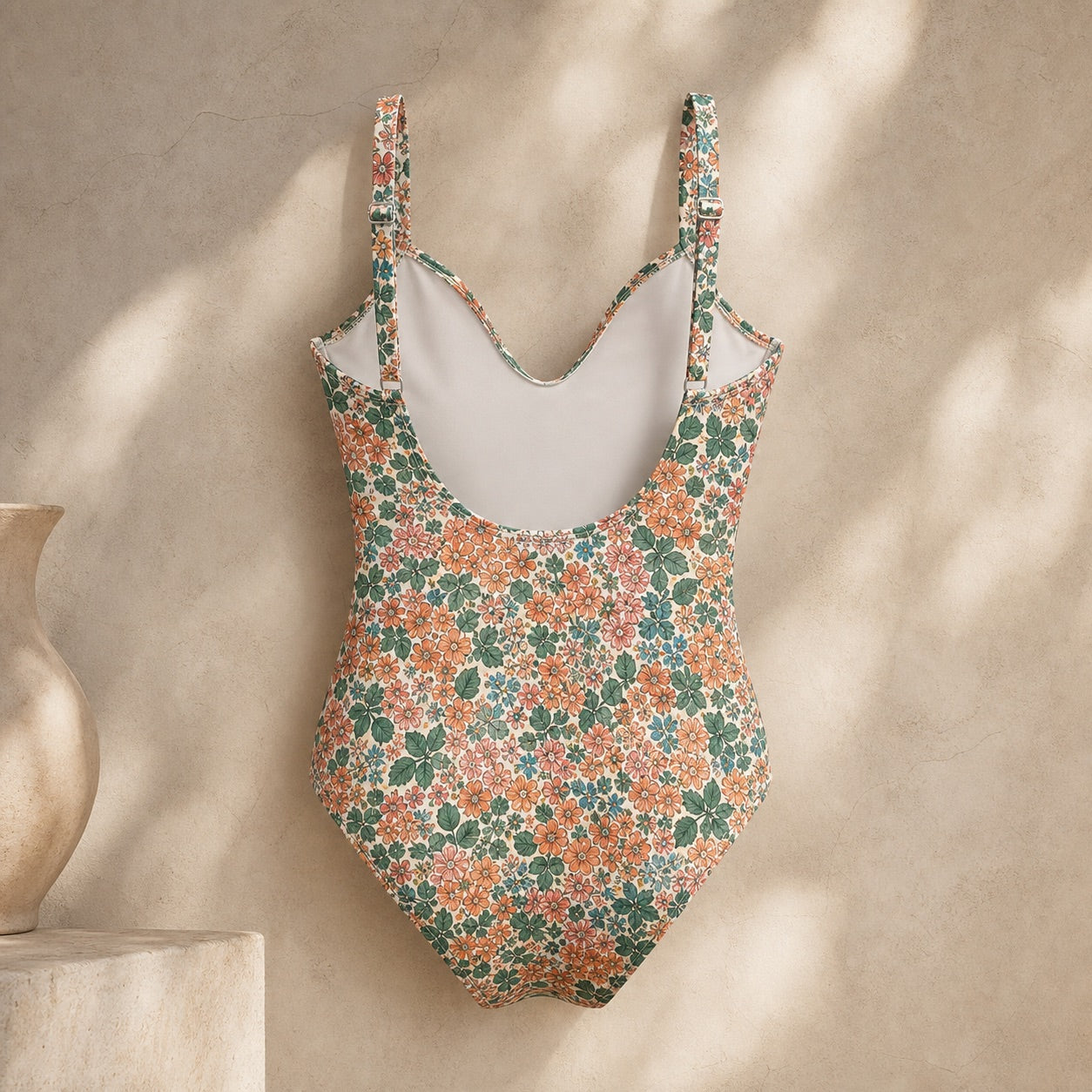 Soravea Marguerite floral one-piece swimsuit open back view