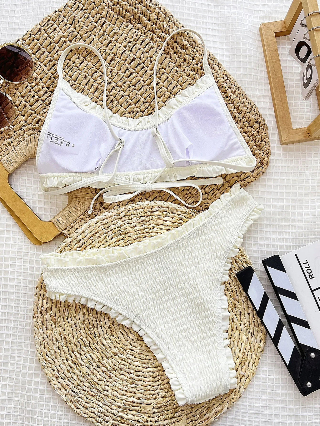 SORAVEA Alma off-white volangbikini Cloud Dancer flatlay