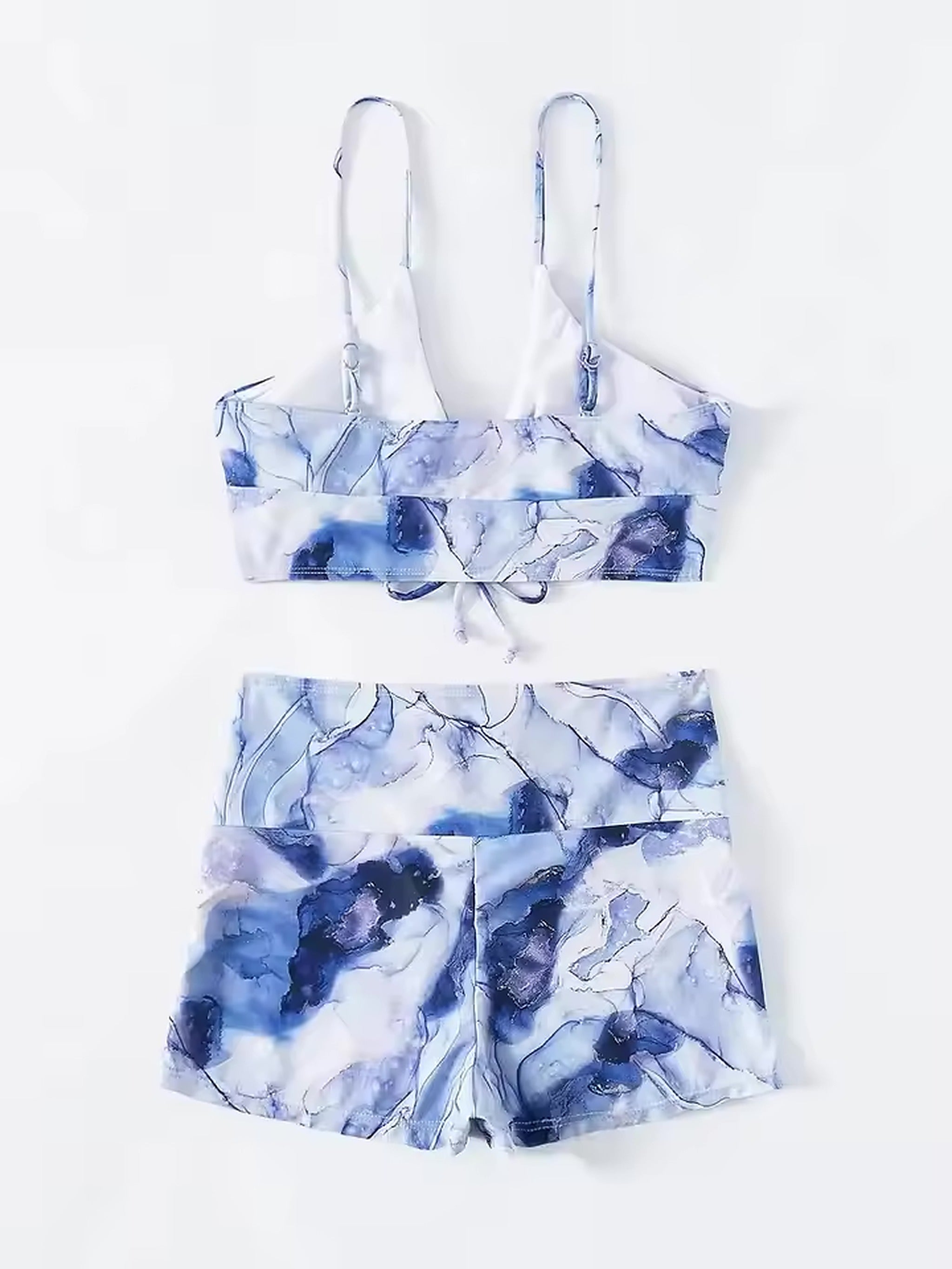 Blue watercolor print bikini set with adjustable straps and tie-front crop top paired with high-waisted shorts