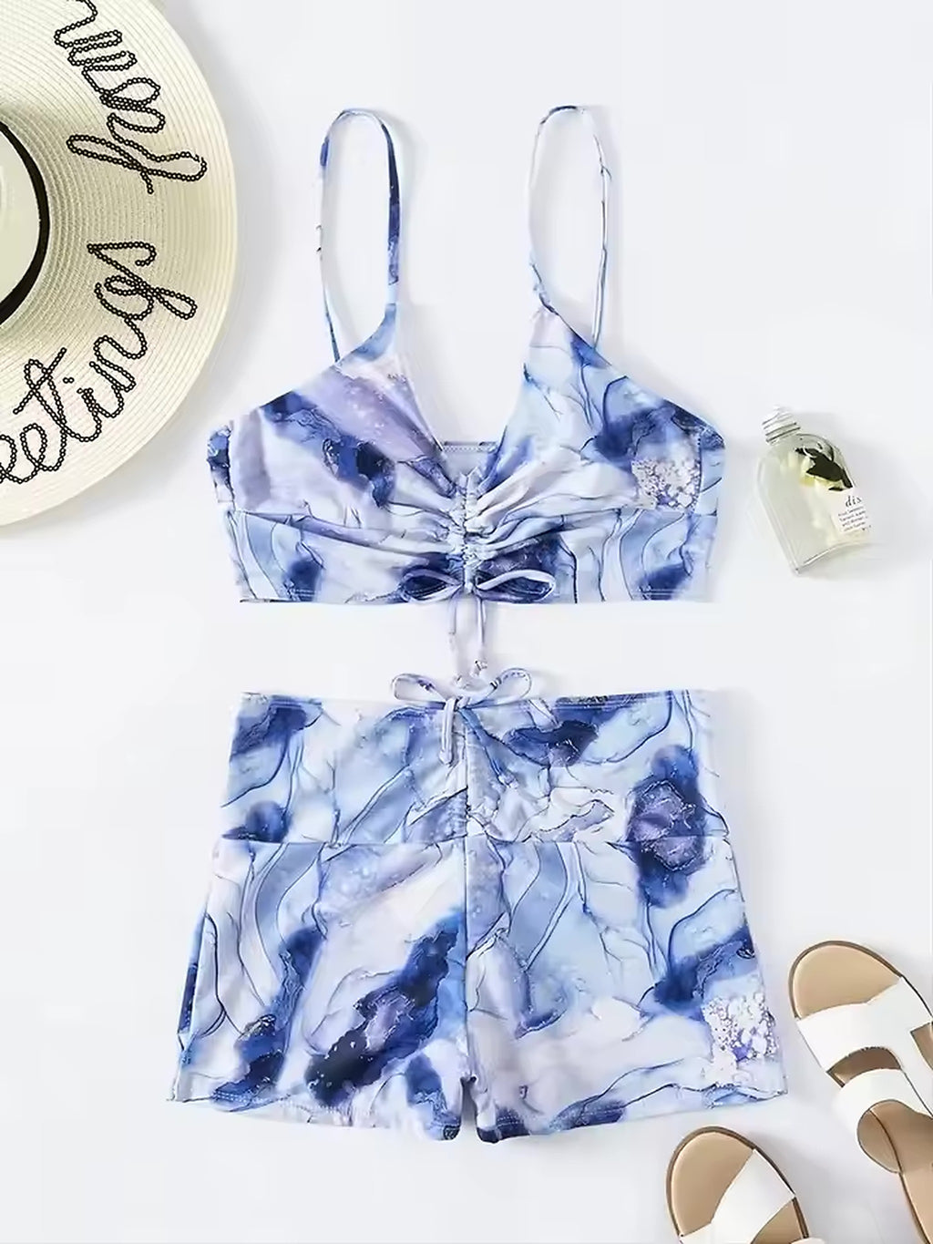 Blue watercolor tie-dye bikini set with ruched front detail and adjustable straps