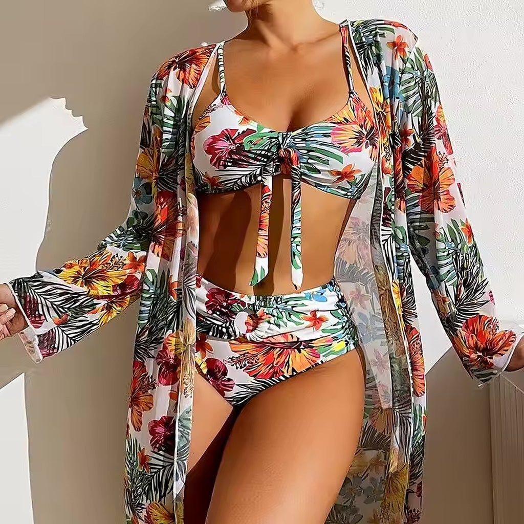Tropical floral bikini set with colorful flowers and palm leaves on white background, paired with matching cover-up kimono