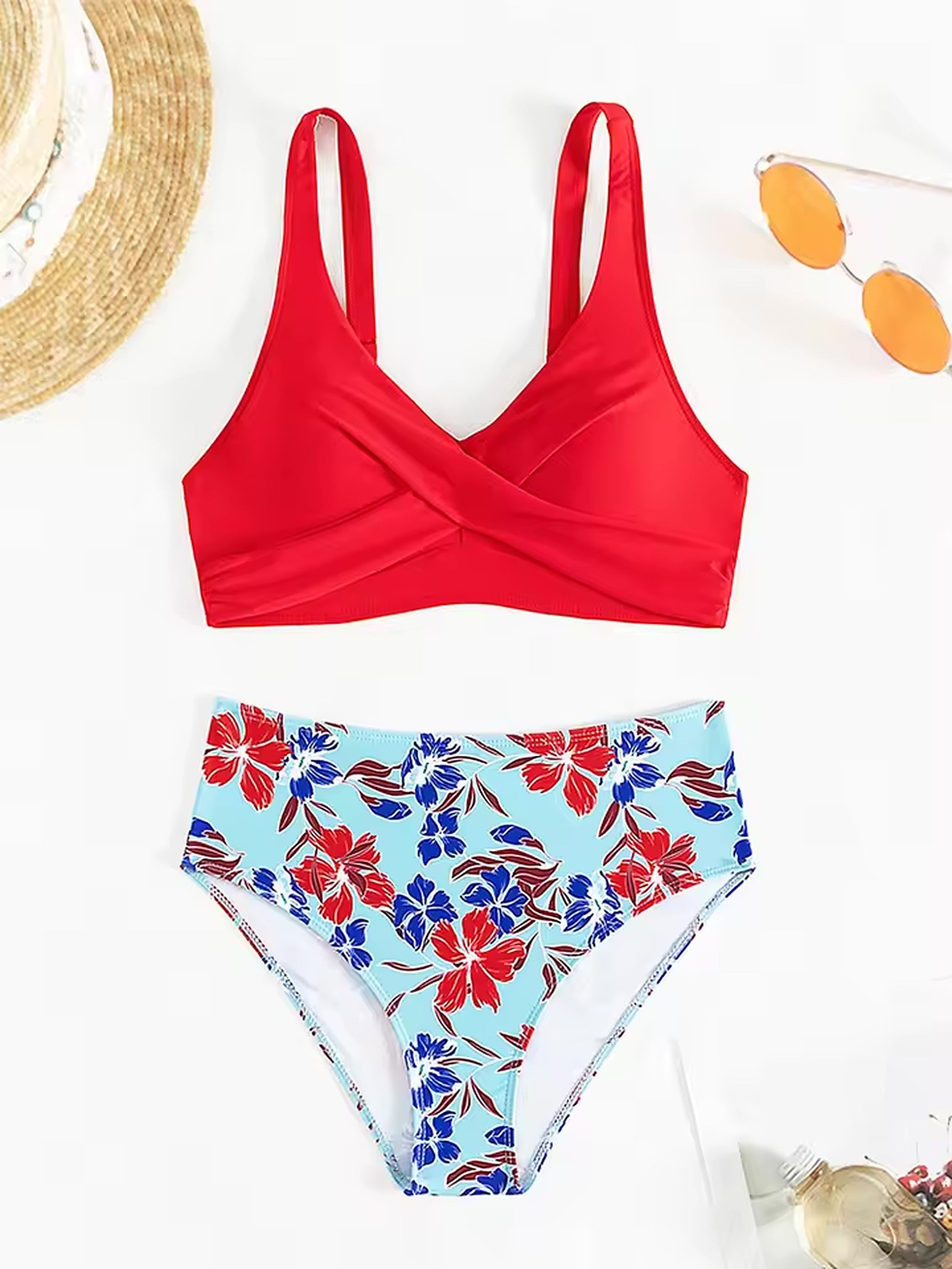 Red wrap bikini top with floral print high-waist briefs, styled with straw hat and sunglasses